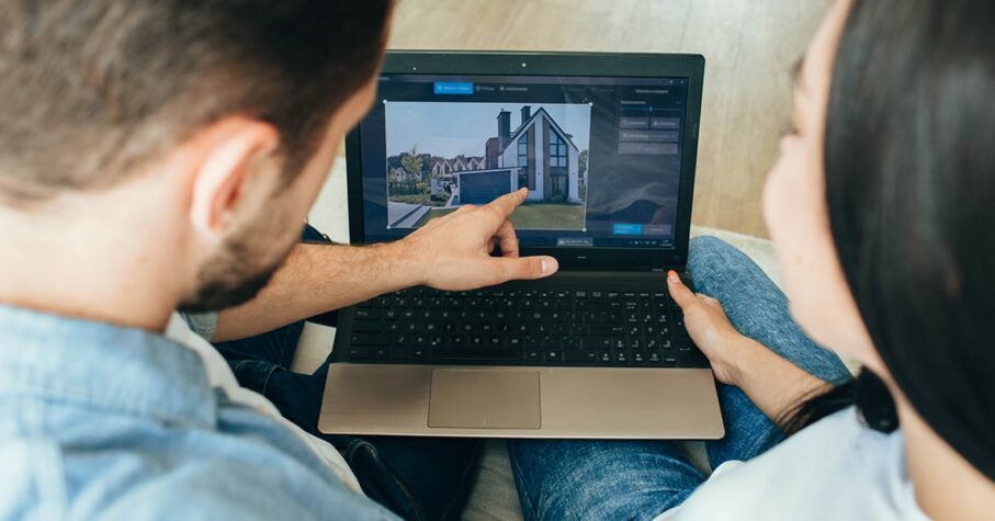 couple browsing online to buy their dream home