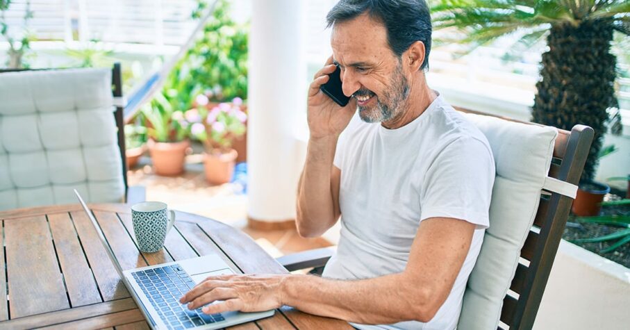 Senior man working from home as phase retirement program