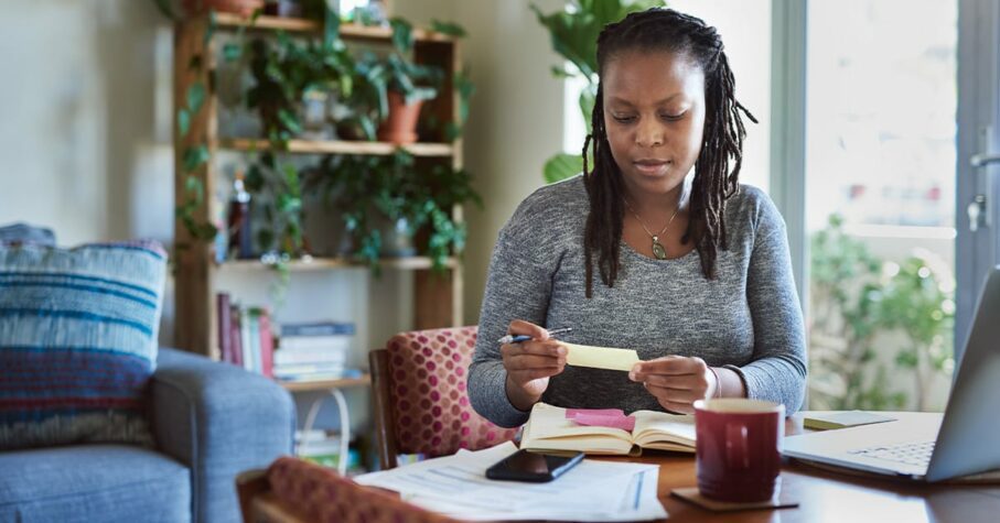 African american woman reviewing her finances