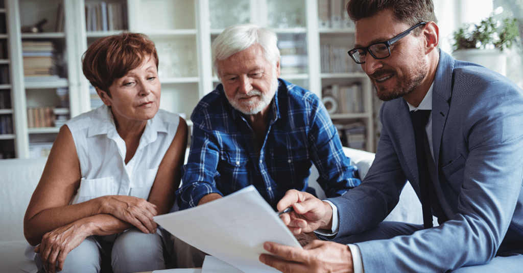 Senior couple doing estate planning with Advisor